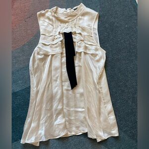Silk Theory sleeveless blouse with vaguely tuxedo pleats and velvet neck tie